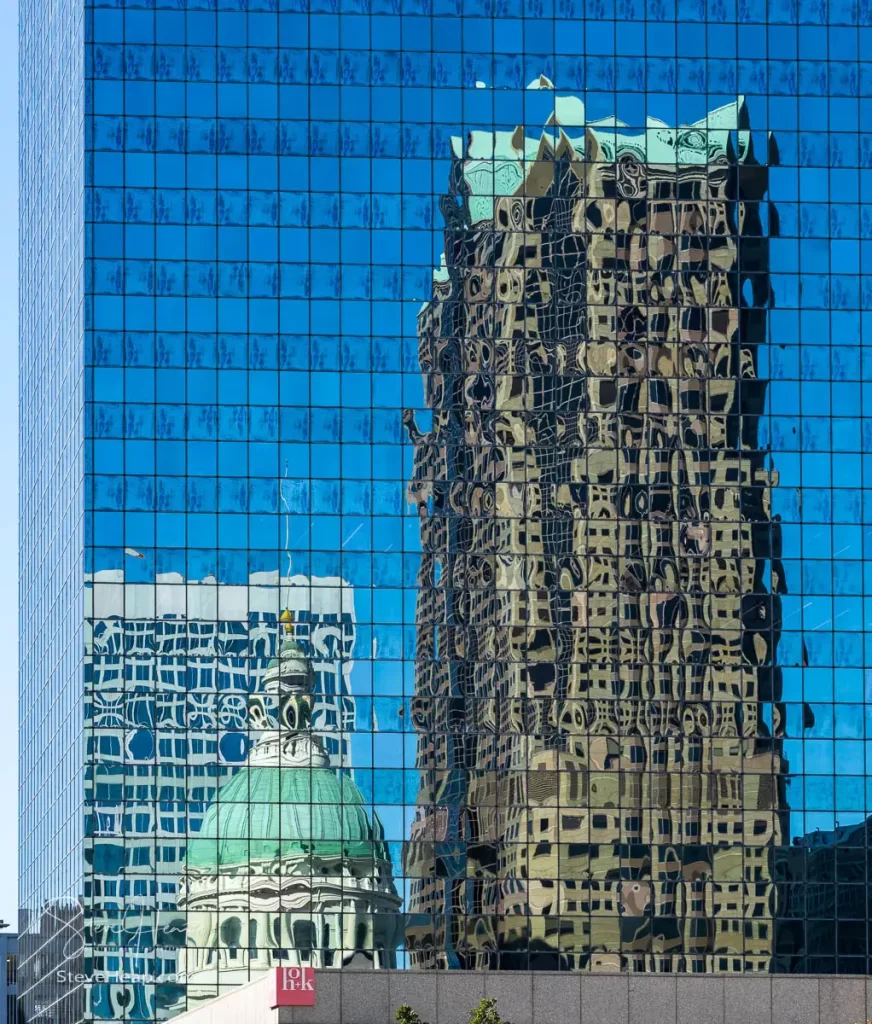 The reflection of One Metropolitan Square in the mirrored glass windows of a skyscraper in St Louis, Missouri