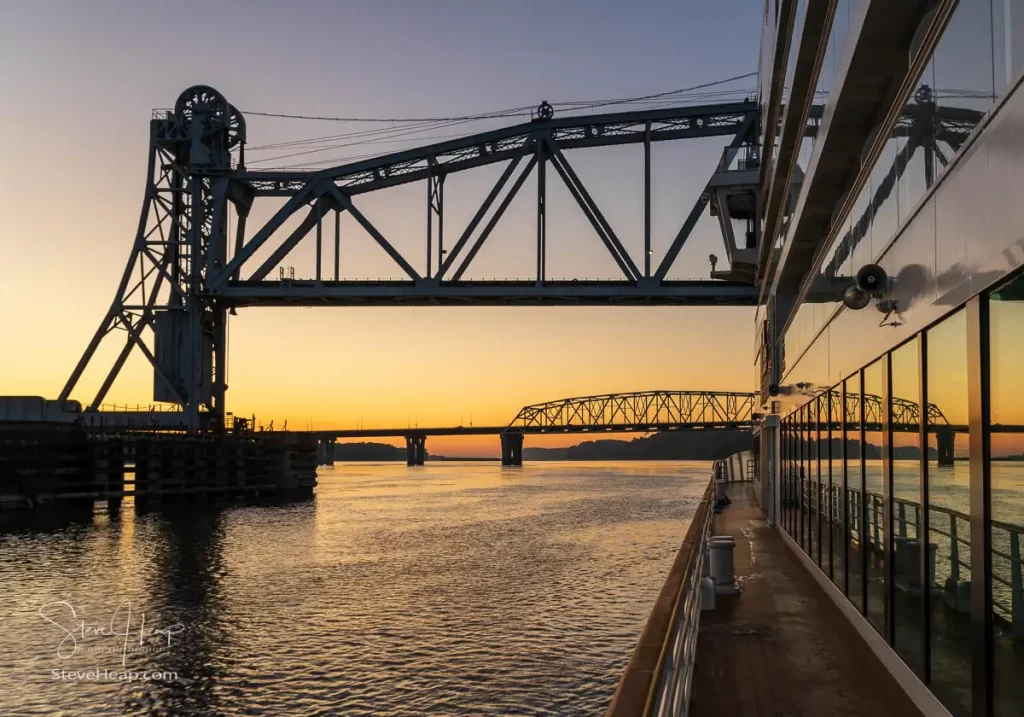 Sailing under the Wabash railroad bridge at sunrise as we approach Hannibal, MO. Prints available in my online store