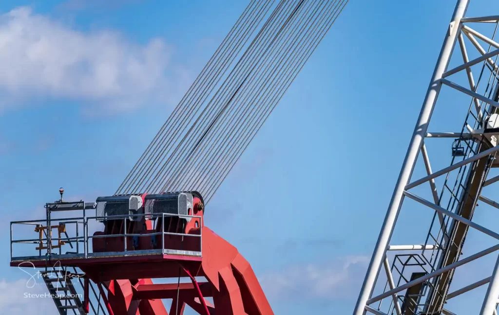 The high gearing obtained by these many steel cables controlling the lift on the floating crane