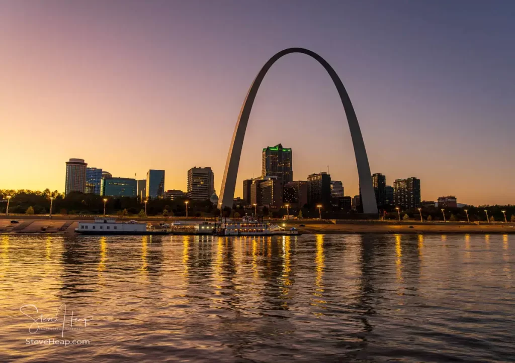 Brilliant colors in the sunset sky behind the Gateway Arch and St Louis skyline. Prints available in my online store