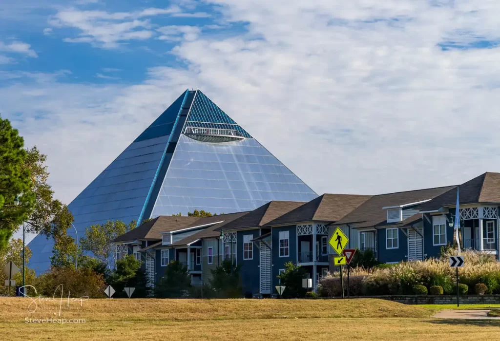 The Memphis Pyramid towers over the modern homes in the Harbor Town development of Memphis. Prints available in my online store