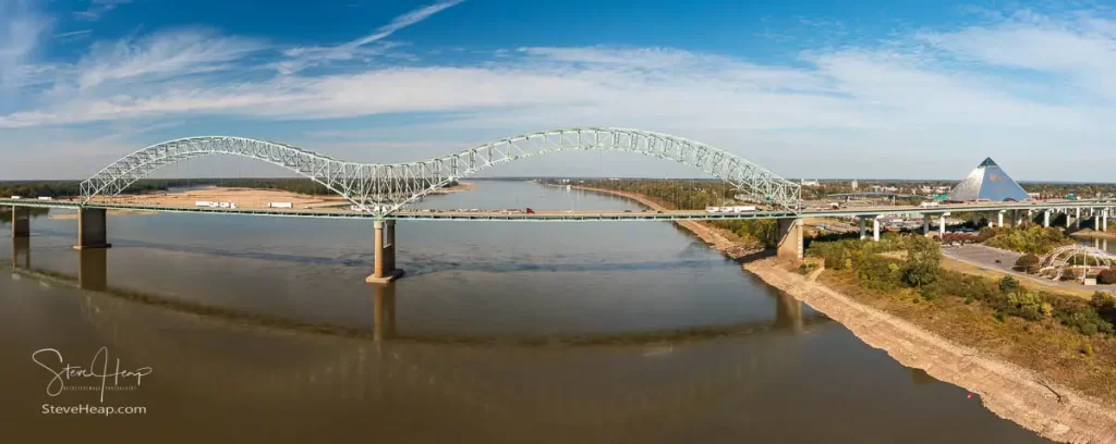 Hernando de Soto bridge across the Mississippi river with the Memphis Pyramid on the right