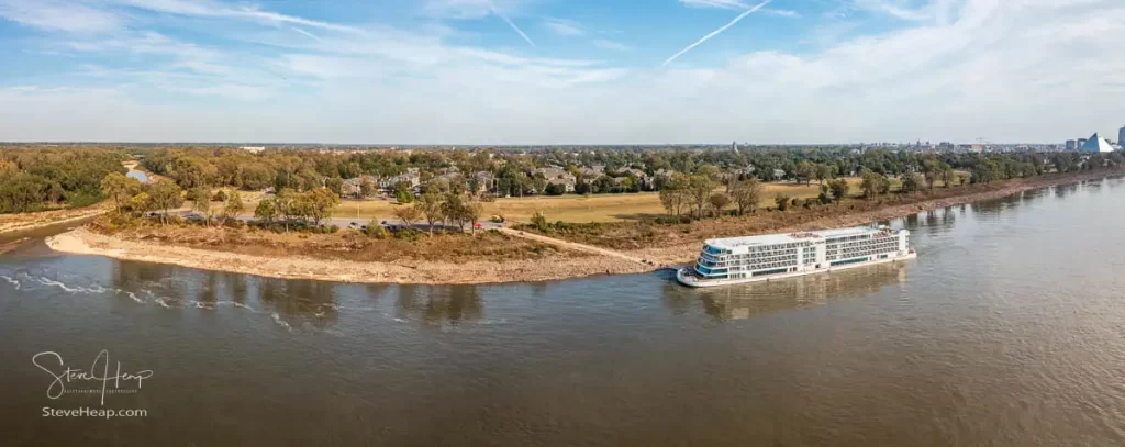 Viking Mississippi docked alongside Mud Island in Memphis, Tennessee. You can see the start of downtown by the large pyramid!