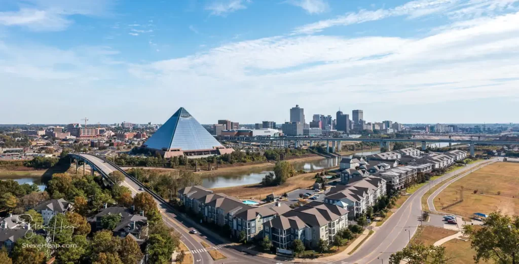 The Memphis Pyramid in front of downtown Memphis with Harbor Town in the foreground.