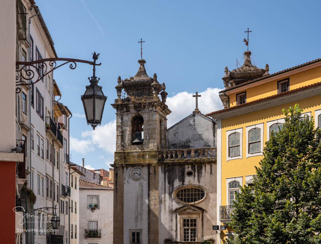 Old church tower of Sao Bartholomeu church in downtown Coimbra in Portugal