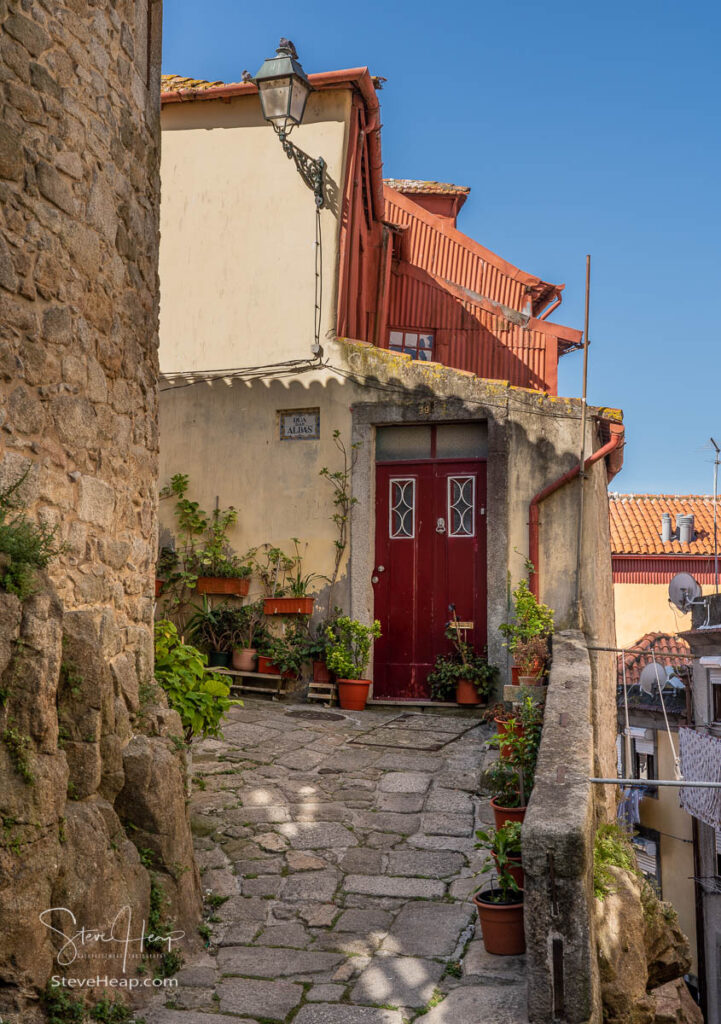 Narrow cobbled streets lead to intriguing destination in the old town of Porto in Portugal