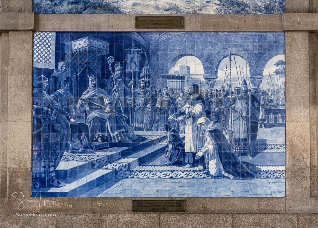 Decorative ceramic tiles show the history of Portugal in the main railway station entrance hall in Porto, Portugal