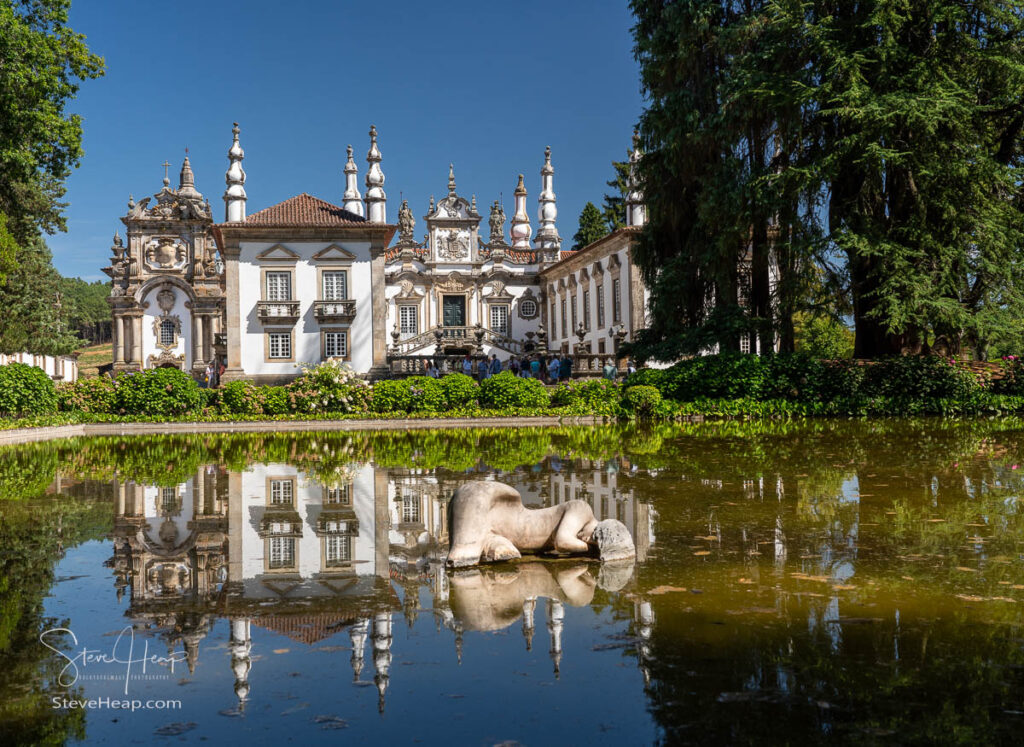 Woman Sleeping statue in the reflecting pond in front of the entrance of Mateus Palace in Vila Real, Portugal