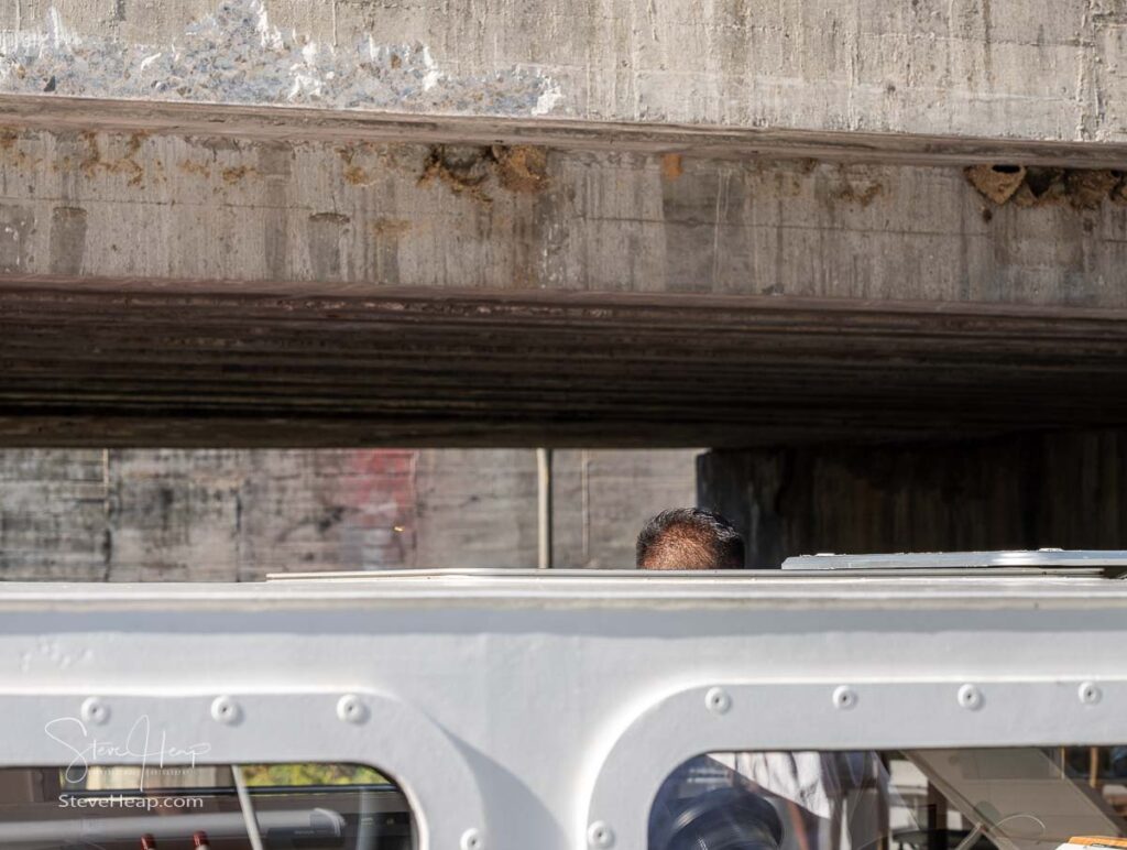 Little headroom above river cruise boat as it rises inside the lock of the Valeira dam on River Douro in Portugal