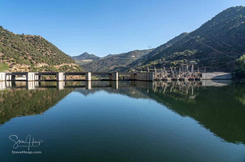 Solid structure of the Valeira dam on River Dourowith lock and gates on the left