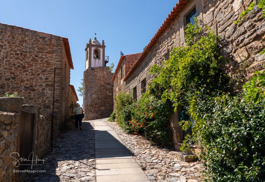 Old stone houses and narrow street in the ancient town of Castelo Rodrigo in Portugal