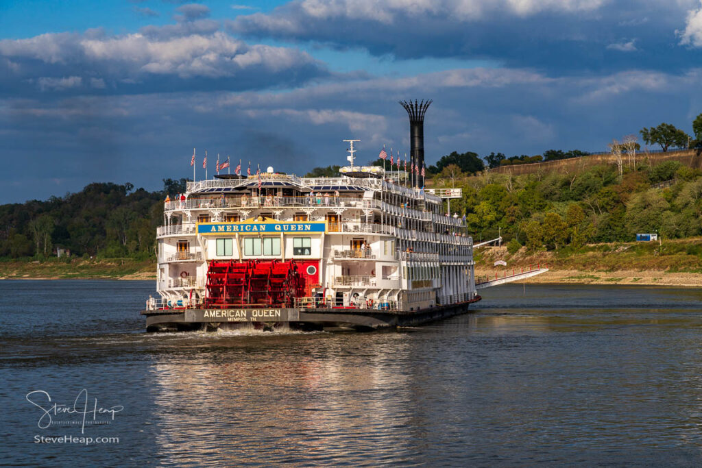 Paddle steamer river cruise boat American Queen departs in low water from Natchez Mississippi. Prints available in my online store