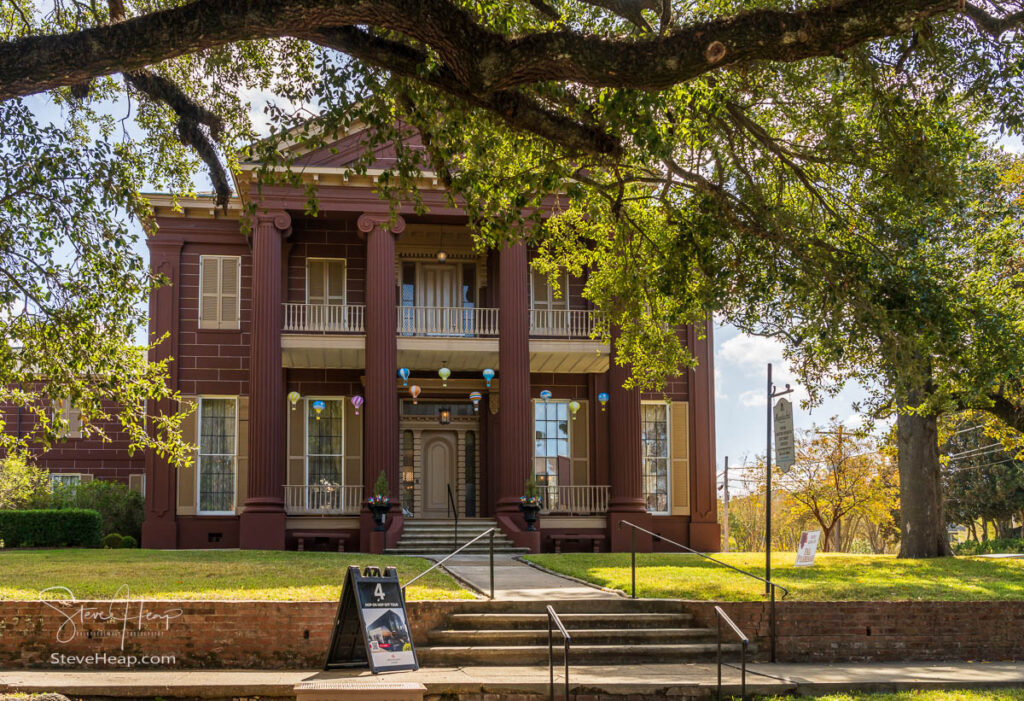 Front facade of historic mansion known as Magnolia Hall in Natchez Mississippi