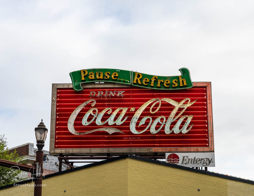 Original design of historic retro Coca Cola sign on rooftop in Baton Rouge, the state capital of Louisiana