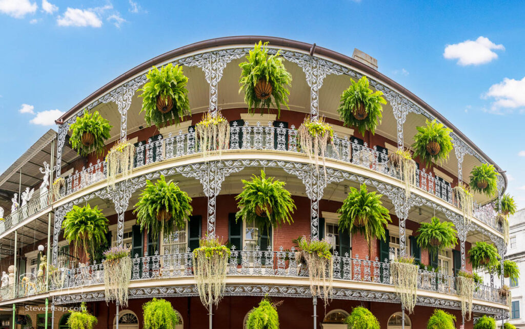 Wide angle view of hanging baskets on the LaBranche House in the French Quarter on Royal Street, New Orleans. Prints in my online store