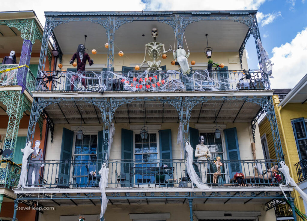 Halloween decorations on traditional building in the French Quarter with wrought iron balconies