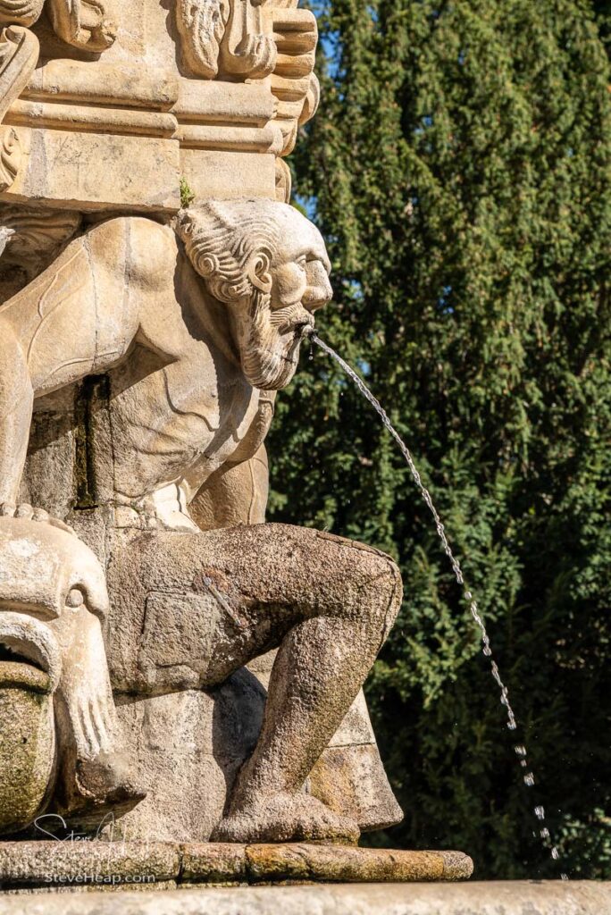 Statue on the fountain along the baroque staircase to the Santuario de Nossa Senhora dos Remedios church