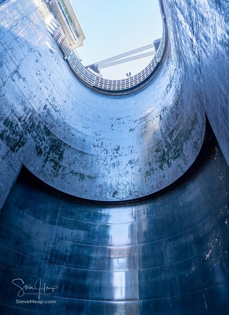 View towards the sky inside the very deep lock of the Barragem do Carrapatelo on Douro River in Portugal