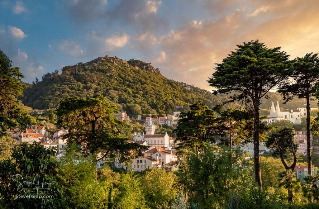 Sunset view of the Portuguese town of Sintra with the Moorish fortress on the hilltop above the city