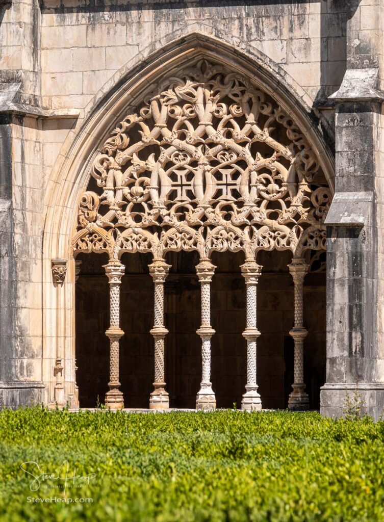 Exterior archway to cloisters at the Batalha Monastery near Leiria in Portugal