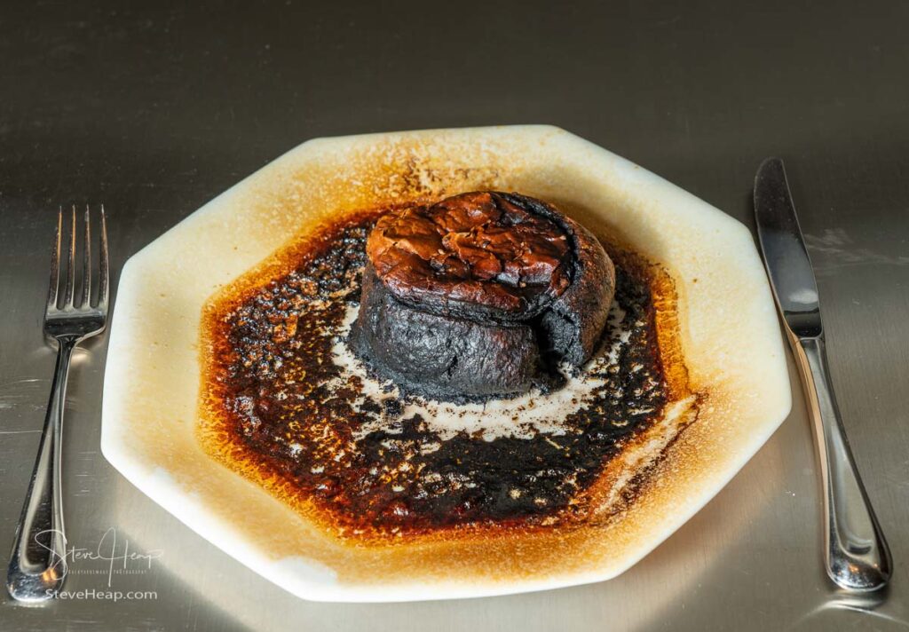 Pastry meat pie completely charred and burned after leaving in the microwave oven too long
