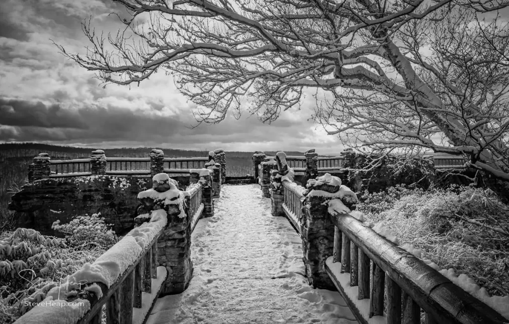 Black and white rendition of the wooden bridge and pathway to Coopers Rock overlook. Prints available in my online store