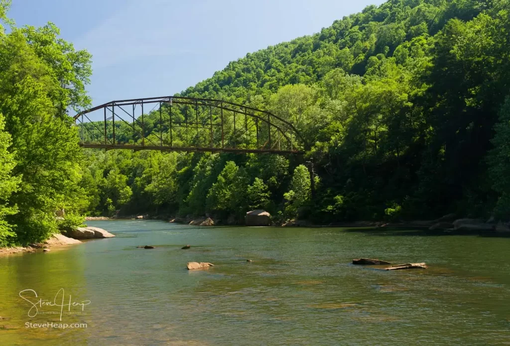 View of 1912 historic metal truss Jenkinsburg Bridge near Mt Nebo and Morgantown over Cheat River