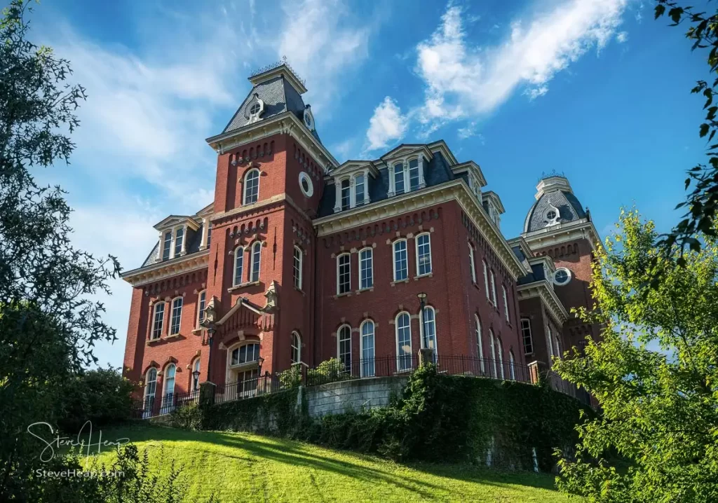 The historic Woodburn Hall at West Virginia University or WVU in Morgantown WV seen from below and looking up towards the rear and side of the building.