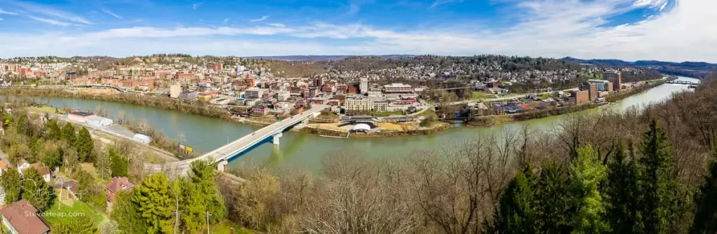 Aerial drone panoramic view of the downtown area of Morgantown in West Virginia and the campus of the university.