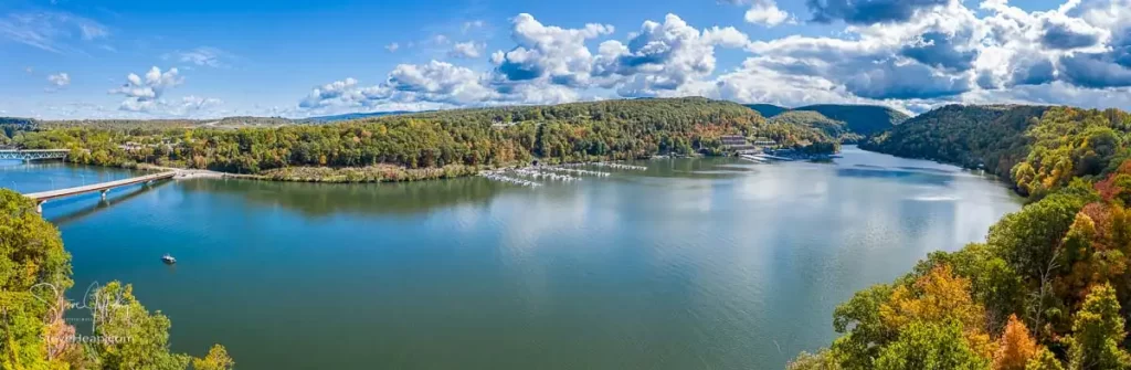 Aerial drone panorama of the autumn fall colors surrounding Cheat Lake near Morgantown West Virginia