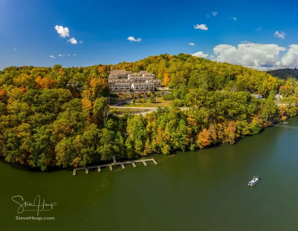 Fall colors surround the Outlooks townhouse development by Cheat Lake in Morgantown, West Virginia from an aerial drone viewpoint