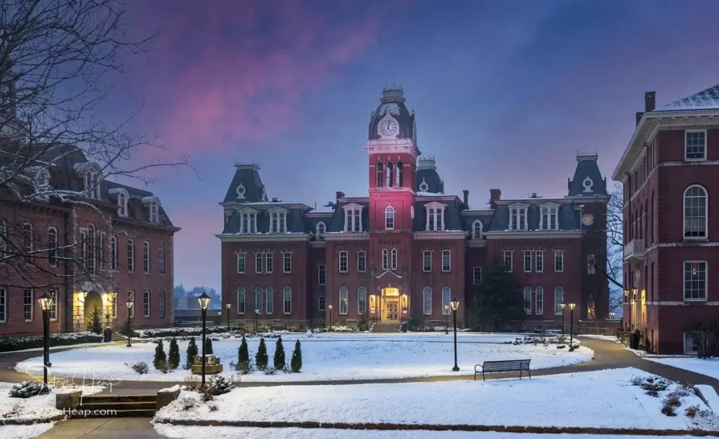 Dramatic image of Woodburn Hall at West Virginia University or WVU in Morgantown WV after a snow fall around the historic building. Perfect for a graduation gift for your student or to grace the wall of a faculty office!