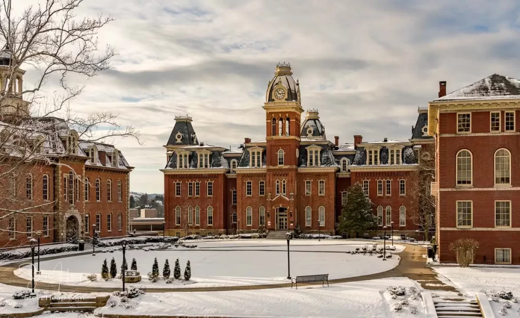 Dramatic image of Woodburn Hall at West Virginia University or WVU in Morgantown WV after a snow fall around the historic building.