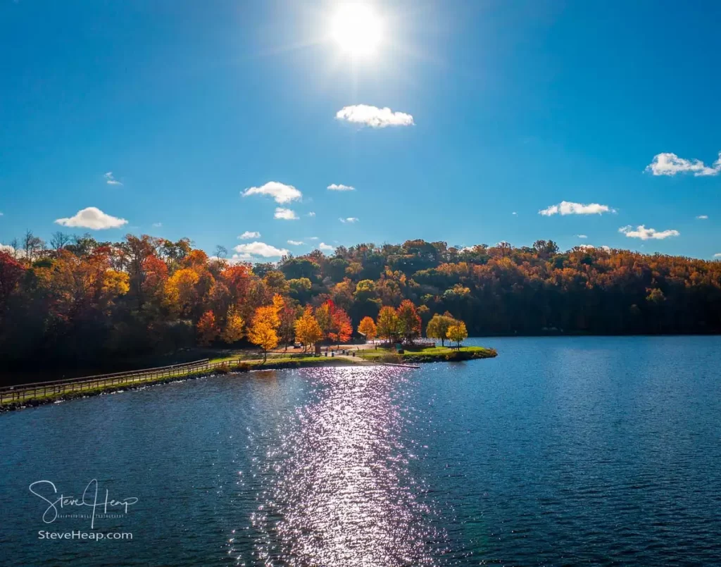 Autumn colors around the Cheat Lake Park on Morgans Run near Morgantown, West Virginia with vertical view down onto the trail and rest area