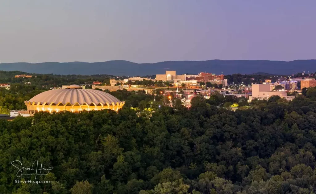 Dusk over the Evansdale district of Morgantown with WVU Coliseum arena and Ruby Hospital in the distance