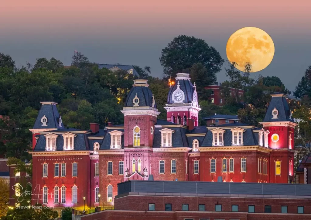 Imagined moonrise over the illuminated facade of the old Woodburn Hall against the trees of downtown campus at West Virginia University in Morgantown. I had calculated that the Harvest moon would rise in this specific region of the sky and was ready for the shot of a lifetime! But the horizon was cloudy and so the moon never made its appearance that night. This is what it could have looked like!