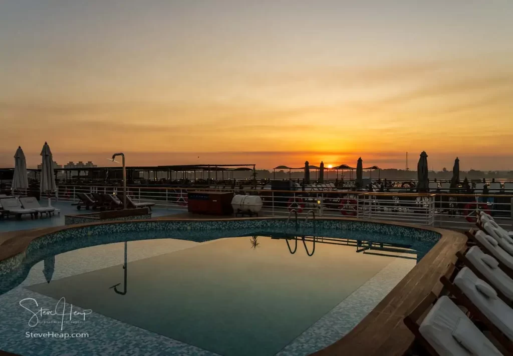 Sunrise over the swimming pool on the MS Antares - with another boat attached to us!