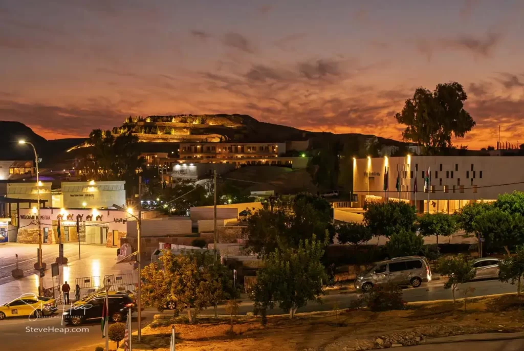 Stunning sunset view from the Movenpick hotel near the entrance to Petra, showcasing the dramatic landscape and vibrant sky.