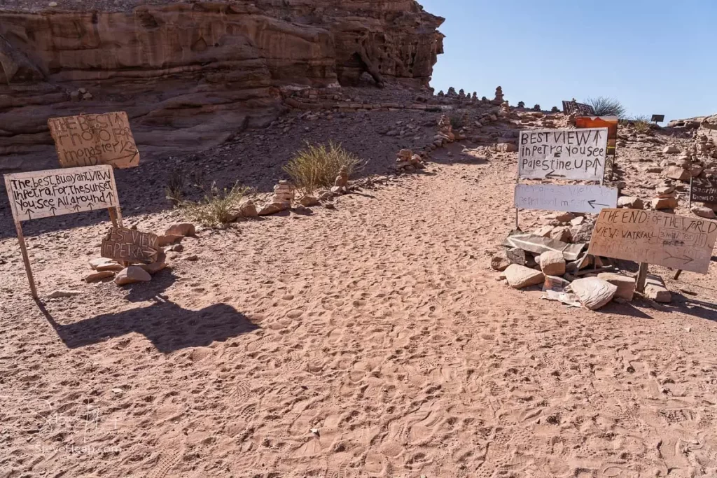 Signs to different views from the top of the trail to the Monastery of rocky mountain range and gorges