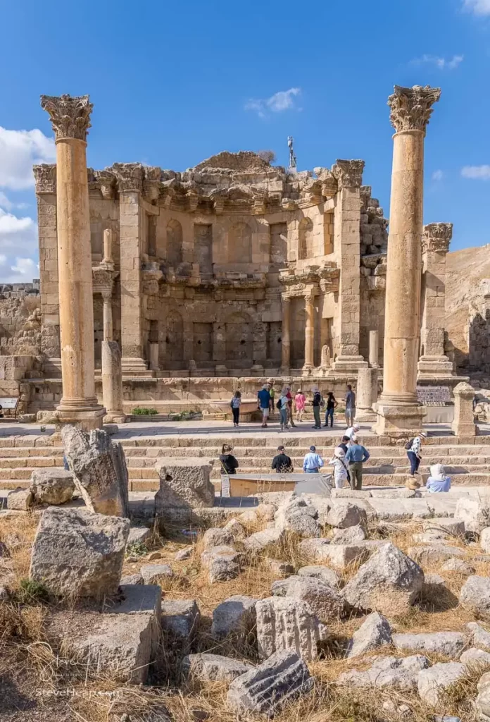 Our group examining the Nymphaeum or public fountain on Cardo Maximus in Jerash