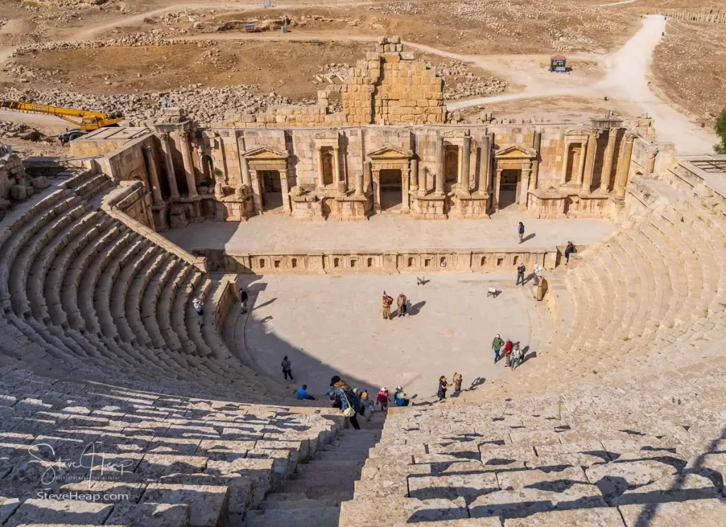 View down from the top of the South Theater in Jerash as a performance by local musicians takes place