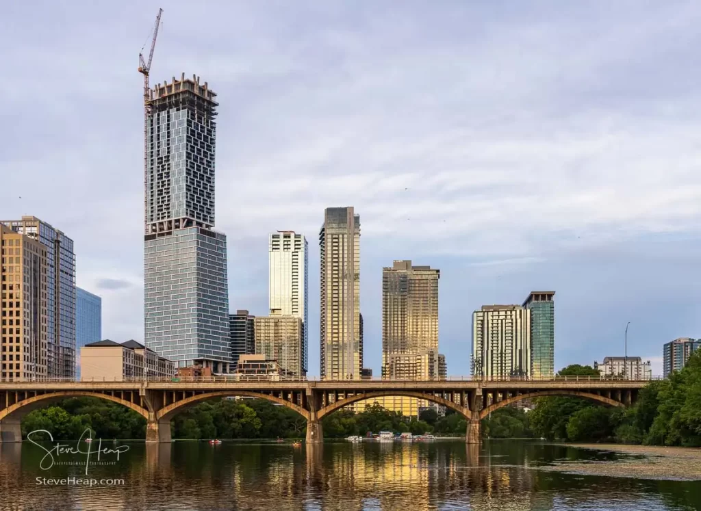 Congress Avenue Bridge in Austin, Texas with the Waterline building behind. Home to 1.5 million bats.