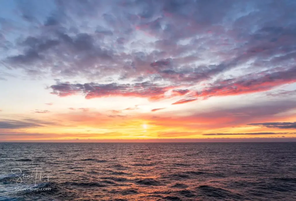 Sunset off the stern of the ship as we were sailing north towards Greenland