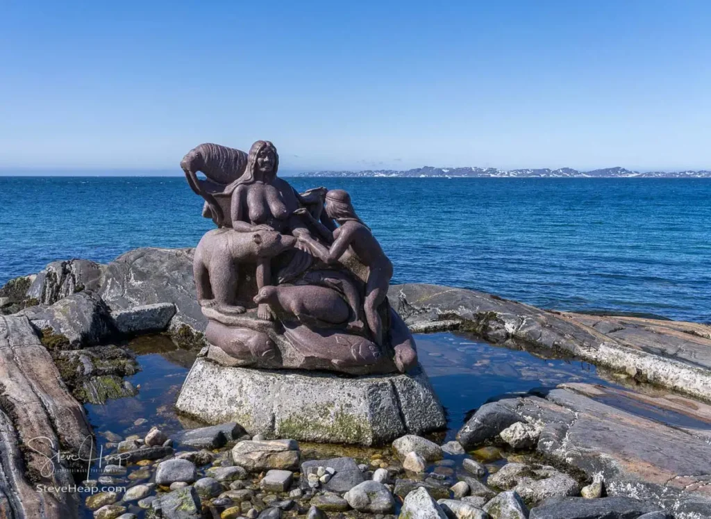 Goddess of the Sea statue on coast of Colonial Harbour in Nuuk by artist Christian "Nuunu" Rosing