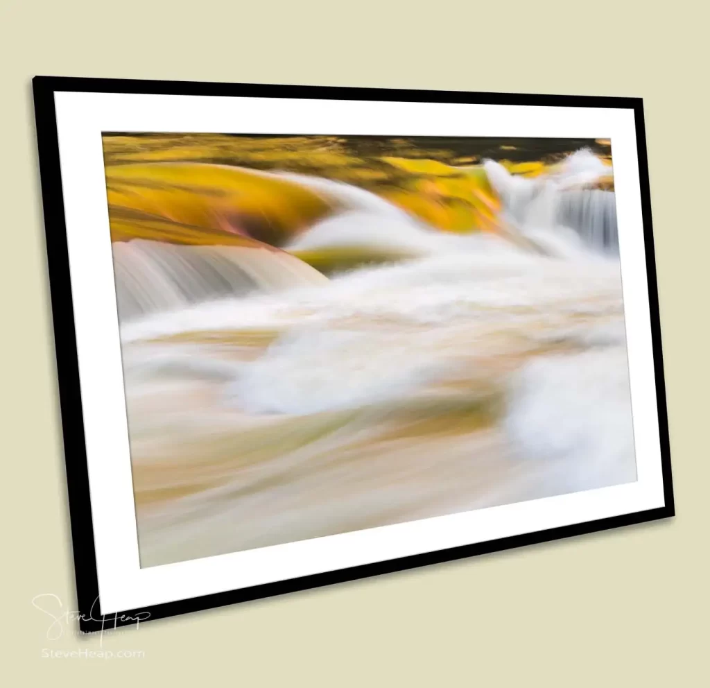 Surging water of the flooded Tygart River in the Valley Falls state park in West Virginia provided as a framed print to a high-end financial office in Texas