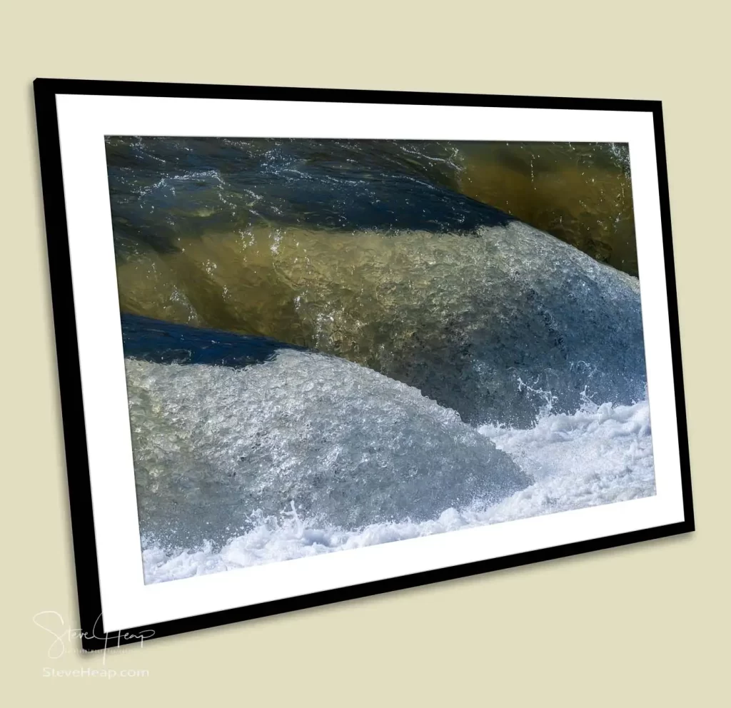 Surging water of the flooded Tygart River in the Valley Falls state park in West Virginia provided as a framed print to a high-end financial office in Texas