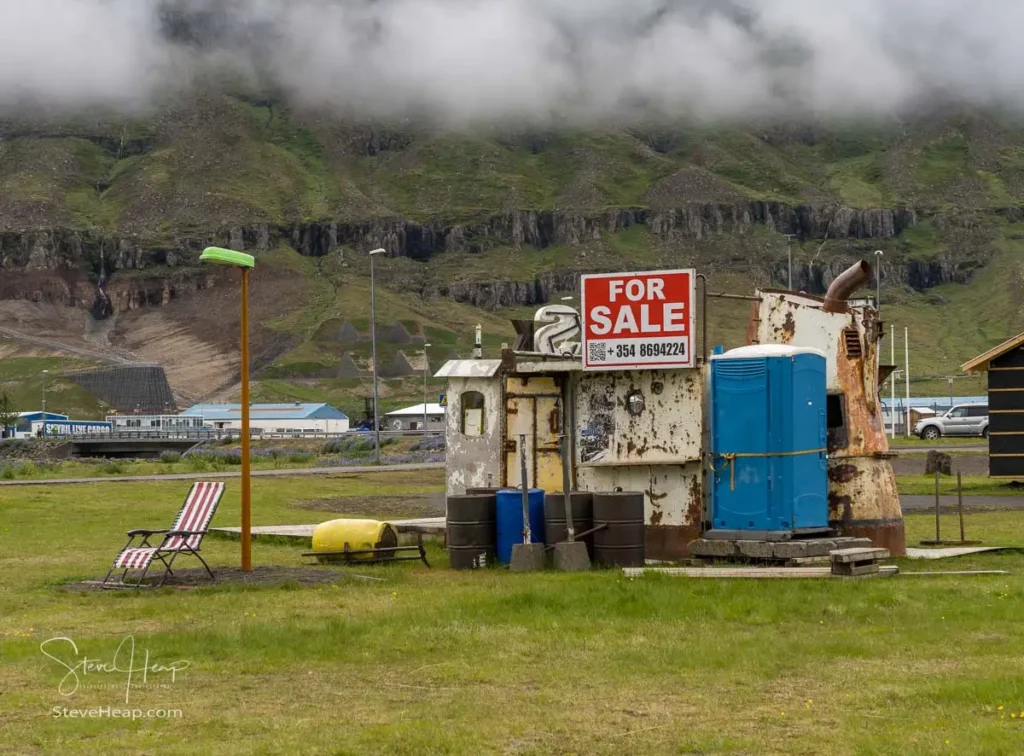 Quirky bar created in old ship cabin in downtown under steep mountains