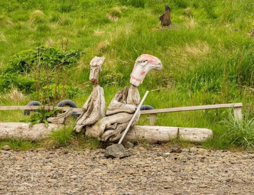 Driftwood figures perhaps modelled after the play, Waiting for Godot?