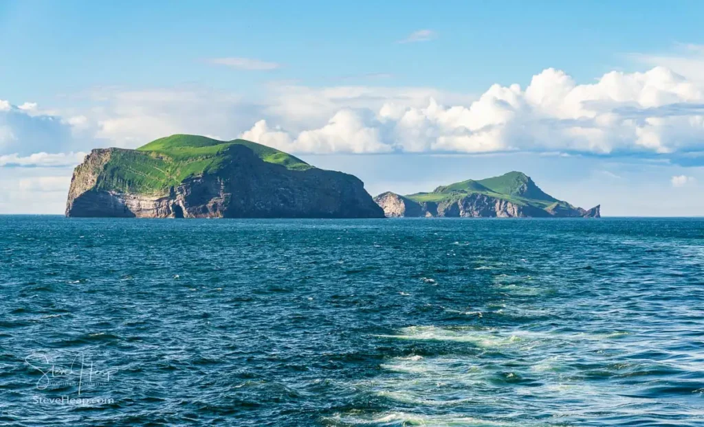 Sailing past the uninhabited island near Heimaey in the Westman Islands in Iceland