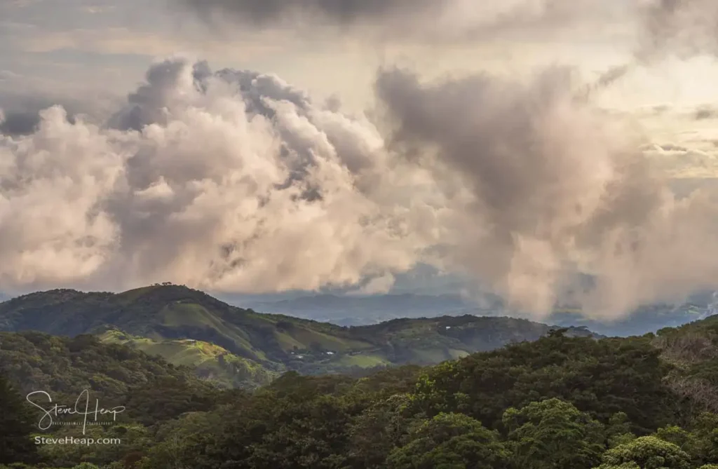 Sunset over the hills leading to the Pacific Ocean from hotel in Monteverde Costa Rica